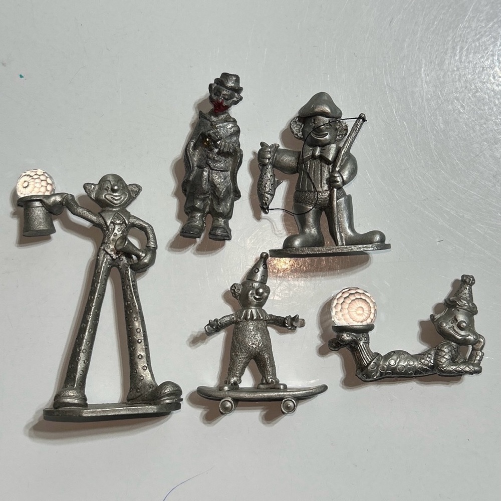 Vintage pewter clown figurines/crystals